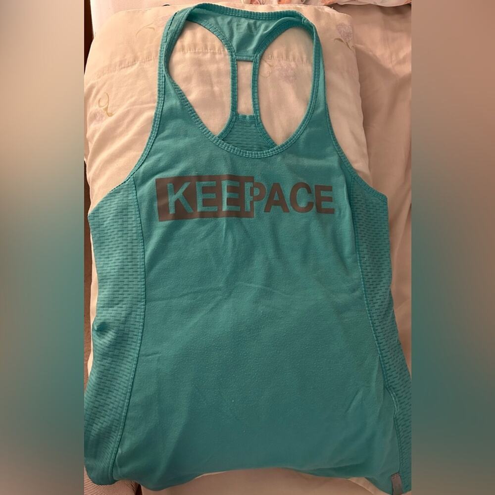 Under Armour turquoise tank top